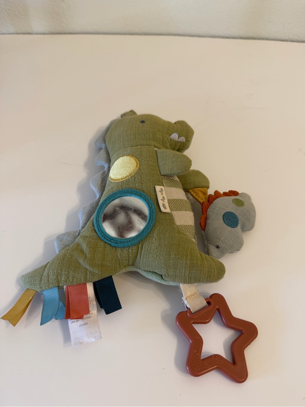Itzy Ditzy Plush Green Dino Sensory Toy with Teether - Baby Activity Comforter.